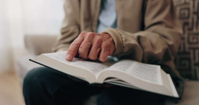Bible, hands and elderly person in living room for morning prayer, worship study or Christian faith in home. Reading, religion and senior pensioner with holy book, gospel or spiritual guide in house