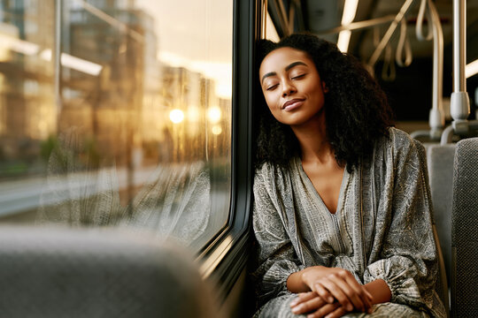 Peaceful Young Woman Resting on a Bus During Golden Hour &ndash; AI Generative &ndash; no real persons