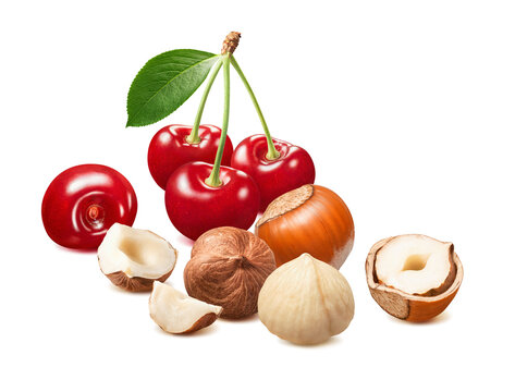 Cherry berries and hazelnut nuts  isolated on white background. Real photography