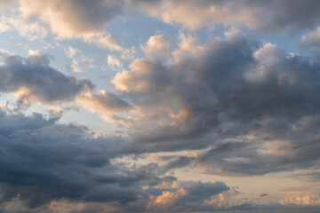 Fototapeta premium Sunset after rain with thunder clouds. Sky background.