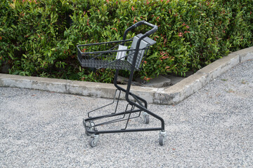 supermarket cart at parking area © pattierstock