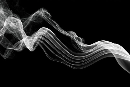 White smoke wisps on black background
