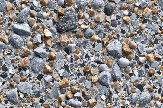 Seamless exposed aggregate concrete pebbles texture background