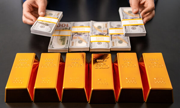 Business success man with gold bar. Golden bar. Golden bar vs dollar money. Rich banker businessman saving gold and cash money. Financial saving success. Successful rich man with gold money