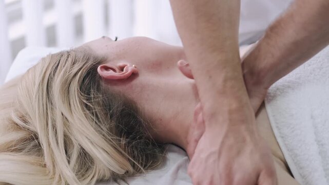 having back and leg  massage by 2 men using 4 hands focusing on the muscles lubing there hands 