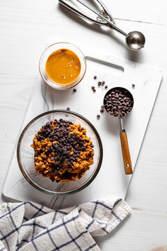 Ingredients for making peanut butter chocolate chip energy balls.