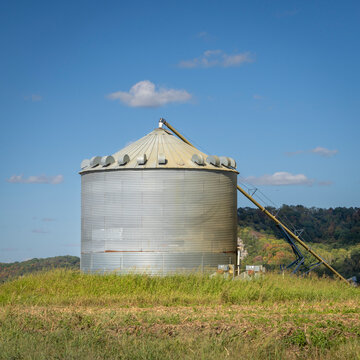 grain silo in a valley of MIssouri River in Missouri, summer scenery