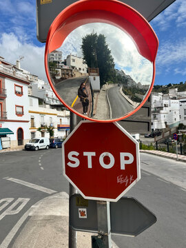 Stop Sign Reflection in Spanish Village