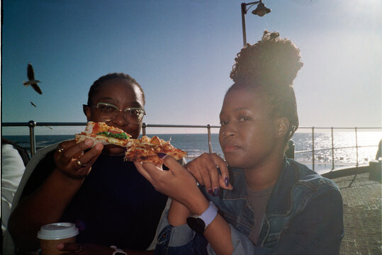 Friends sharing pizza