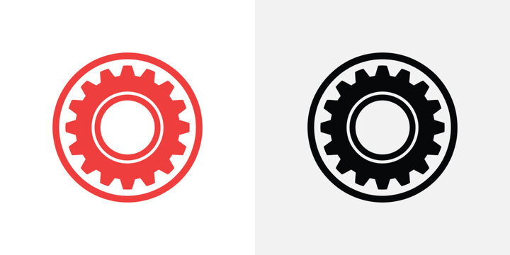 Two gear in red and black colors, isolated on a white background, for industrial, mechanical, and technology settings