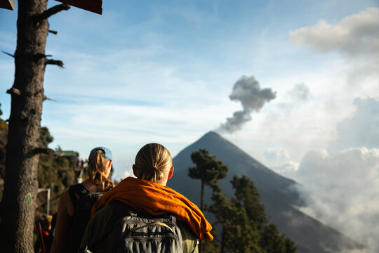 Hikers watching active Volc&aacute;n de Fuego eruption