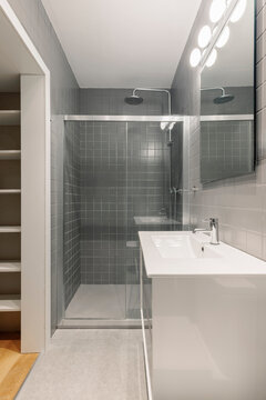 Bathroom Beside Storage Shelves