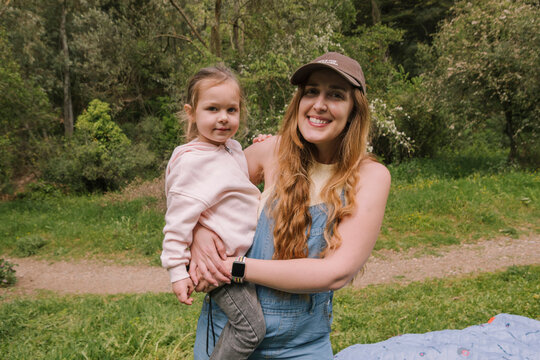 Woman Holding Toddler