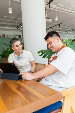 People Working Together in a Modern Office Space During the Afternoon
