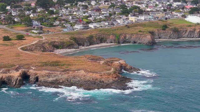 See Mendocino California with its rugged coastline and music festival tent. A look at this coastal village from aerial views.