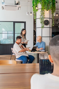 Group Meets in Office for Discussion and Planning