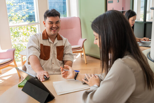 Young People Working Together in a Modern Office Space