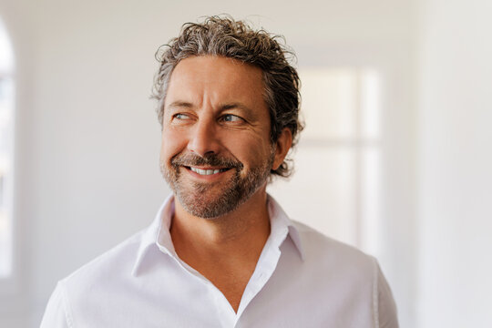 Businessman looking away with positive expression