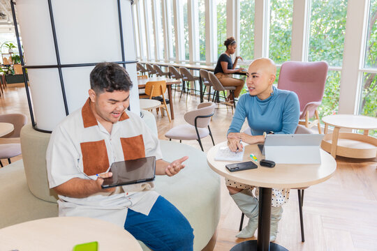 Colleagues Meet at the Office to Discuss Plans and Share Ideas