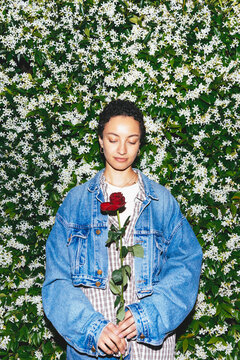 Woman Holding Red Rose