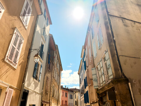 Sun Flare Over Scenic Old Town Street 
