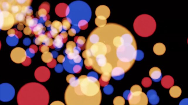 A vibrant and abstract image showcases a blurred array of colorful circles against a dark background, creating a bokeh effect.