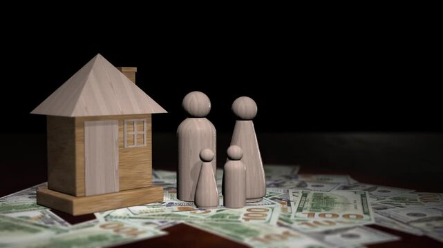 Wooden family figures and a house model sitting on us dollar banknotes with a rotating camera shot.