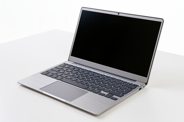 Fototapeta premium The Sleek Laptop on White Desk for Modern Workplace and Innovation