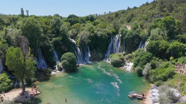 Kravica Waterfall, Bosnia and Herzegovina - June 7, 2026: Aerial view of the famous Kravica Waterfall and turquoise pools during summer