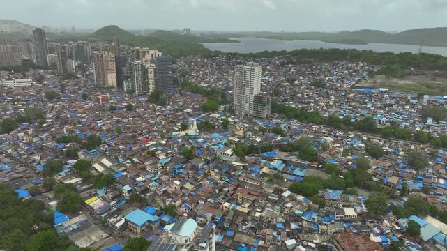 Aerial view of Mumbai slum and modern high rise buildings India