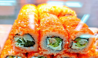  ‘California’ rolls, generously sprinkled with orange flying fish roe (tobiko). © Marina