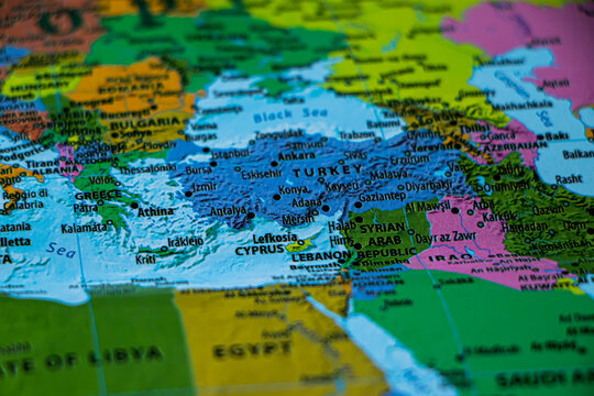 World map closeup with syrian arab on focus. Wonderlust or tour or travel concept.