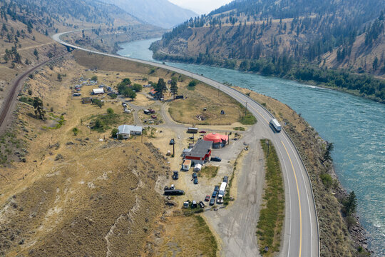 Aerial View Of Highway And Riverside Community Along Thompson River In Bighorn, British Columbia, Canada