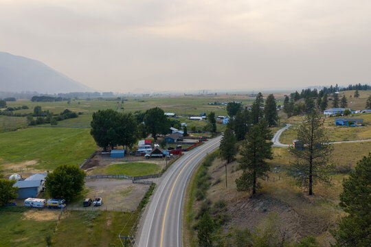 Rural Highway and Foggy Valley Near Merritt With Forest Fire Smoke Over British Columbia Countryside