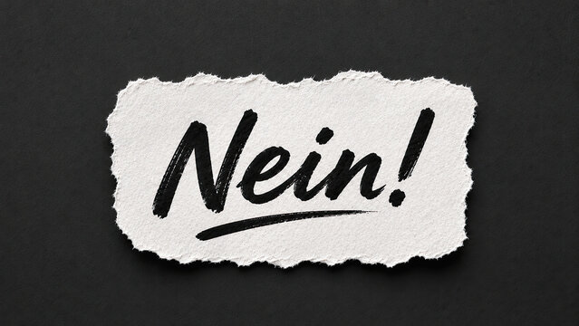 Torn paper with a bold nein message in black ink on a dark background