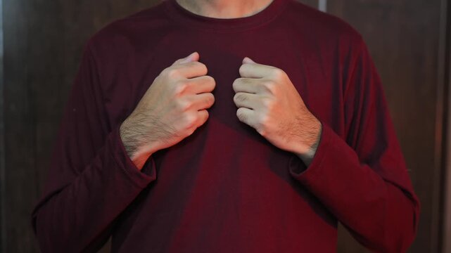 The man beats his chest with his hand to prove something and says it&rsquo;s me.
