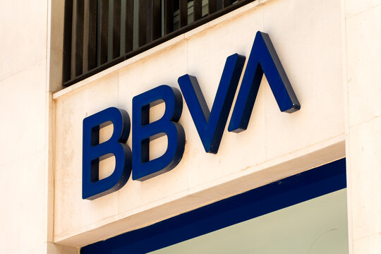 MALAGA, SPAIN - JULY 19, 2022. BBVA logo on BBVA bank branch office. BBVA is the second largest bank in Spain
