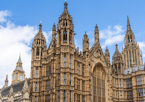 West facade of the Palace of Westminster along Abingdon Street, Gothic Revival masterpiece designed by Charles Barry and Augustus Pugin (1840&ndash;1870), a UNESCO World Heritage Site, London, UK.