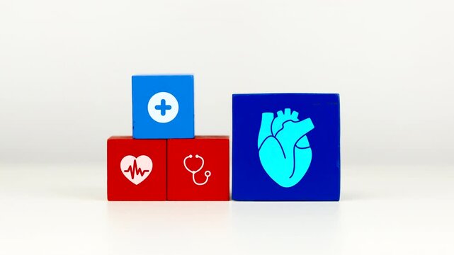 The doctor's hand displays a cube with a heart icon. Raising awareness about heart health and preventing heart failure and arrhythmias.