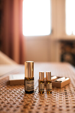 Tel Aviv, Israel 9 of July 2026 - Zielinski Rozen perfume set with mini size and fragrance bottle in 10ml on rattan table close up.
