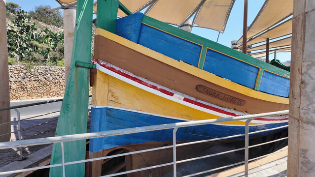 Mgarr, Gozo, Malta - 29.06.2026 - Traditional colorful Malteze boat Luzzu near Gozo ferry terminal.