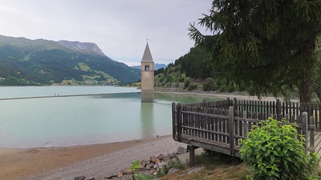 The bell tower- remains from the flooded village Graun - Curon