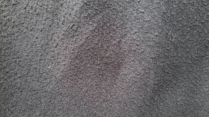 Charcoal gray fleece fabric texture with a soft fuzzy surface © Jus