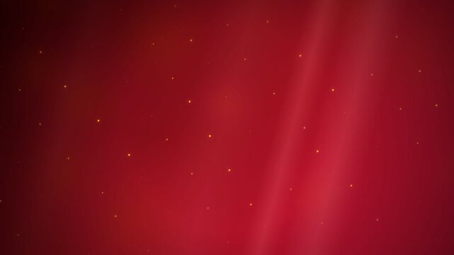 Abstract red background with floating light particles and motion blur. Loop. 4K