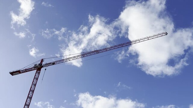 City of Honolulu, Oahu, Hawaii. Trade Wind. Tower crane at a construction site. Ward Village	 