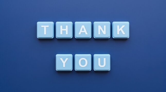Thanksgiving day greeting with blue tiles forming 'thank you' on dark blue background