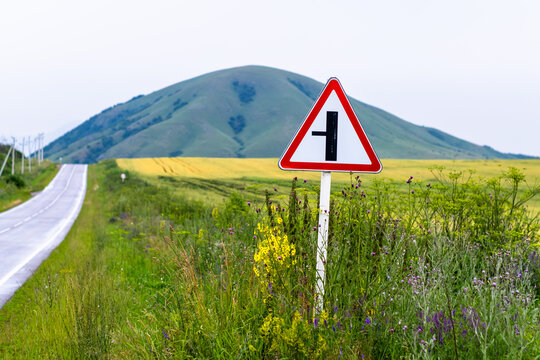 Road sign indicating a turn onto a minor road