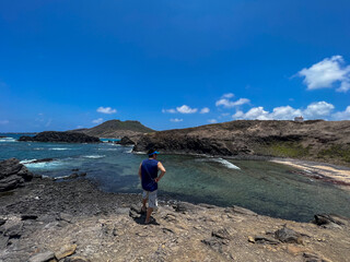 Fototapeta premium Brazil, Fernando de Noronha - 2023, September : man in Caieira Beach 