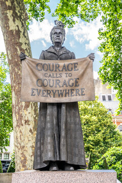 Bronze statue of suffragist Dame Millicent Fawcett by Gillian Wearing (unveiled 2018), the first female and first statue by a woman in Parliament Square, Westminster, London, UK.