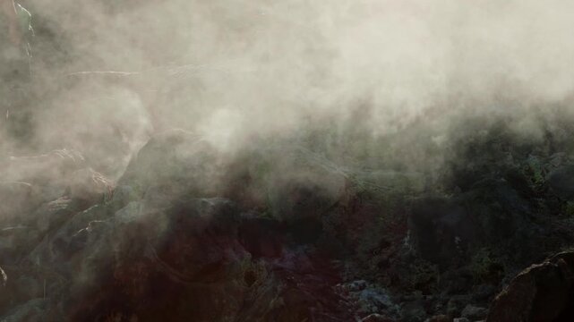 Geothermal steam rising from volcanic rocks at Beitou Thermal Valley